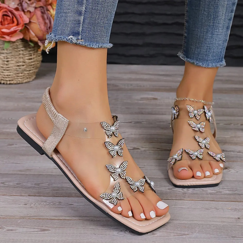 Sandales plates papillon en strass