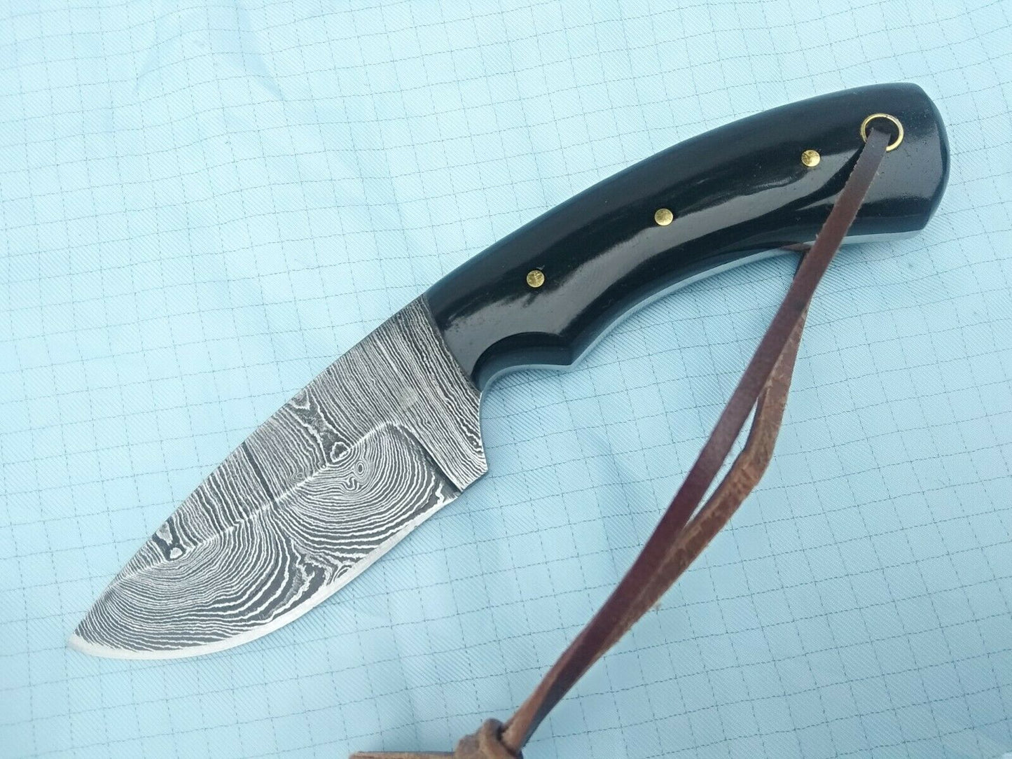Artisan Crafted Damascus Steel Skinning Knife with Buffalo Horn Handle - Korvel