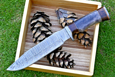 Wilderness Explorer: Premium Damascus Steel Bowie Knife with Elegant Handle and Leather Sheath - Korvel