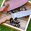 Wilderness Guardian: Premium Damascus Steel Hunting Knife with Rosewood Handle and Leather Sheath - Korvel
