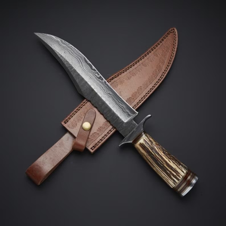 Heritage Hunter: Premium Bowie Knife with Unique Damascus Blade and Antler Handle - Korvel