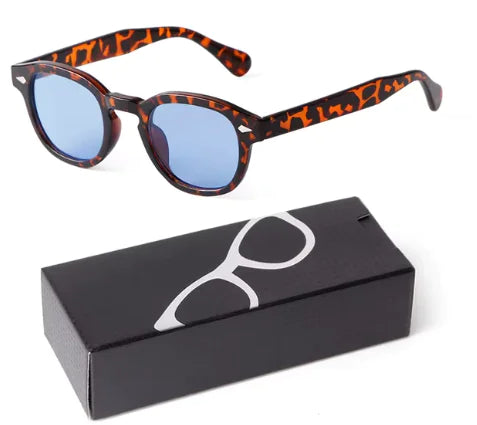Gafas de sol redondas pequeñas en azul degradado para una protección con estilo