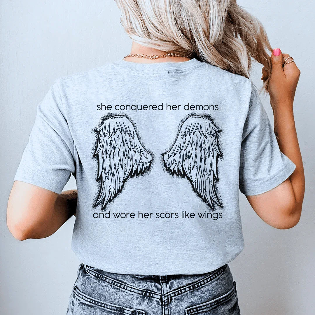 She Conquered Her Demons Tee