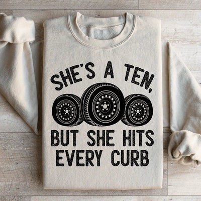 She's A Ten, But She Hits Every Curb Sweatshirt