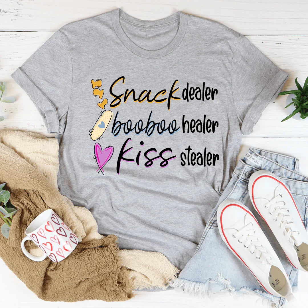 Camiseta del comerciante de bocadillos, el sanador Booboo y el ladrón de besos