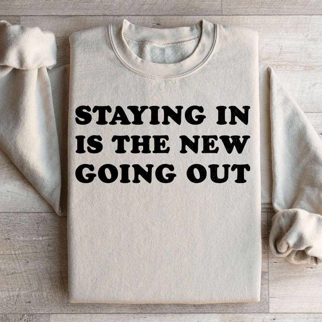 Le sweat-shirt Rester chez soi est le nouveau sortir