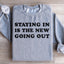 Le sweat-shirt Rester chez soi est le nouveau sortir