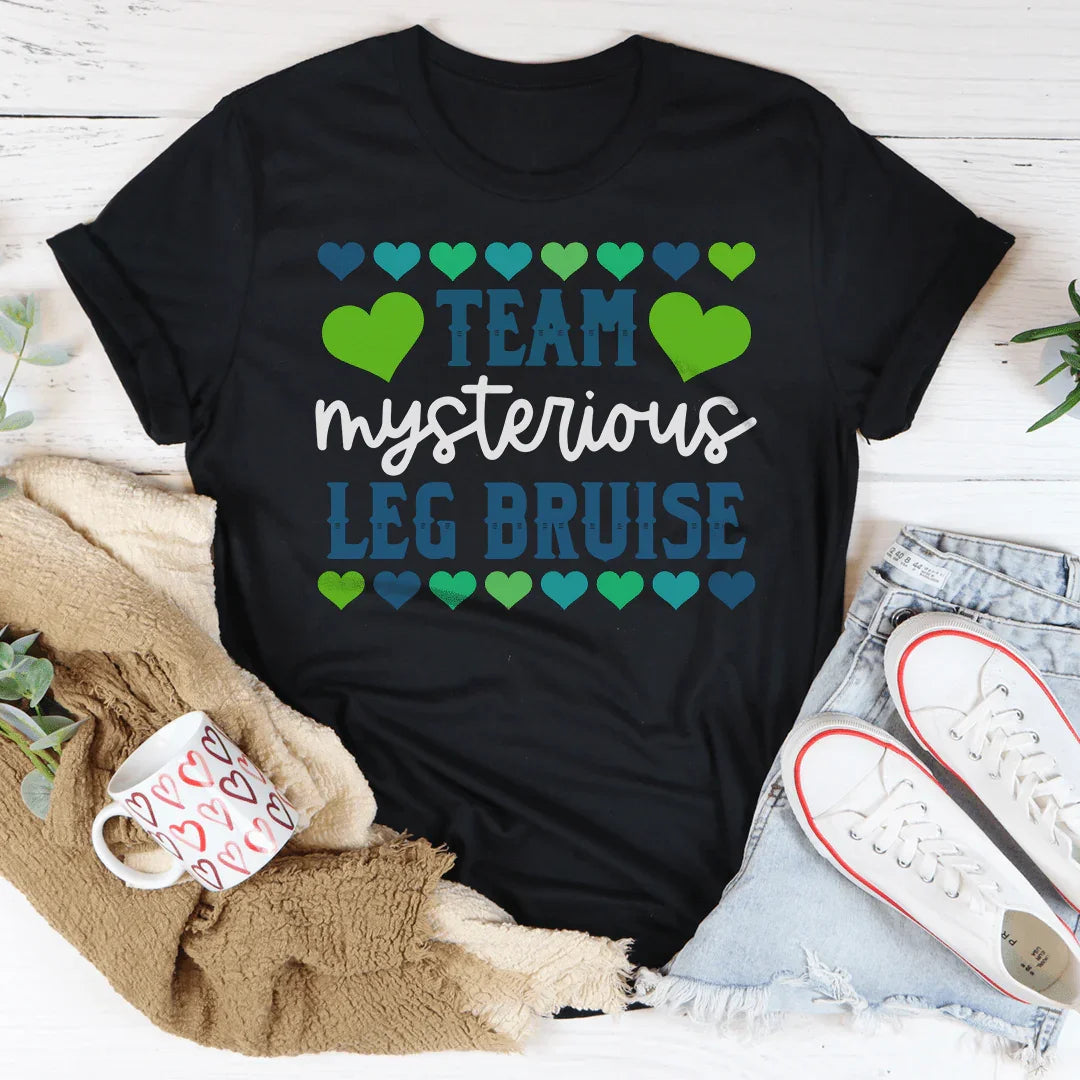 Camiseta del Equipo de Moretones Misteriosos en la Pierna