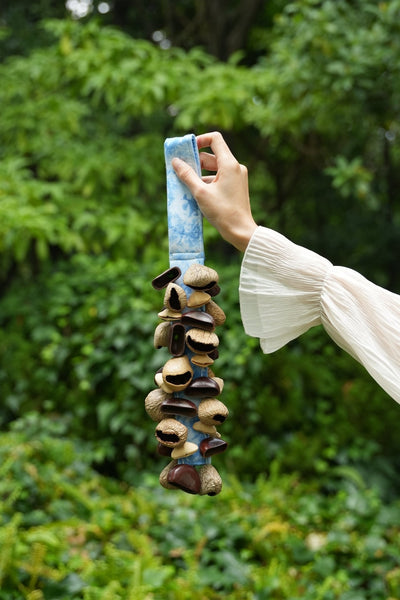 The Blue Tide Rattle - Handheld Seed Shaker with Blue Batik Strap