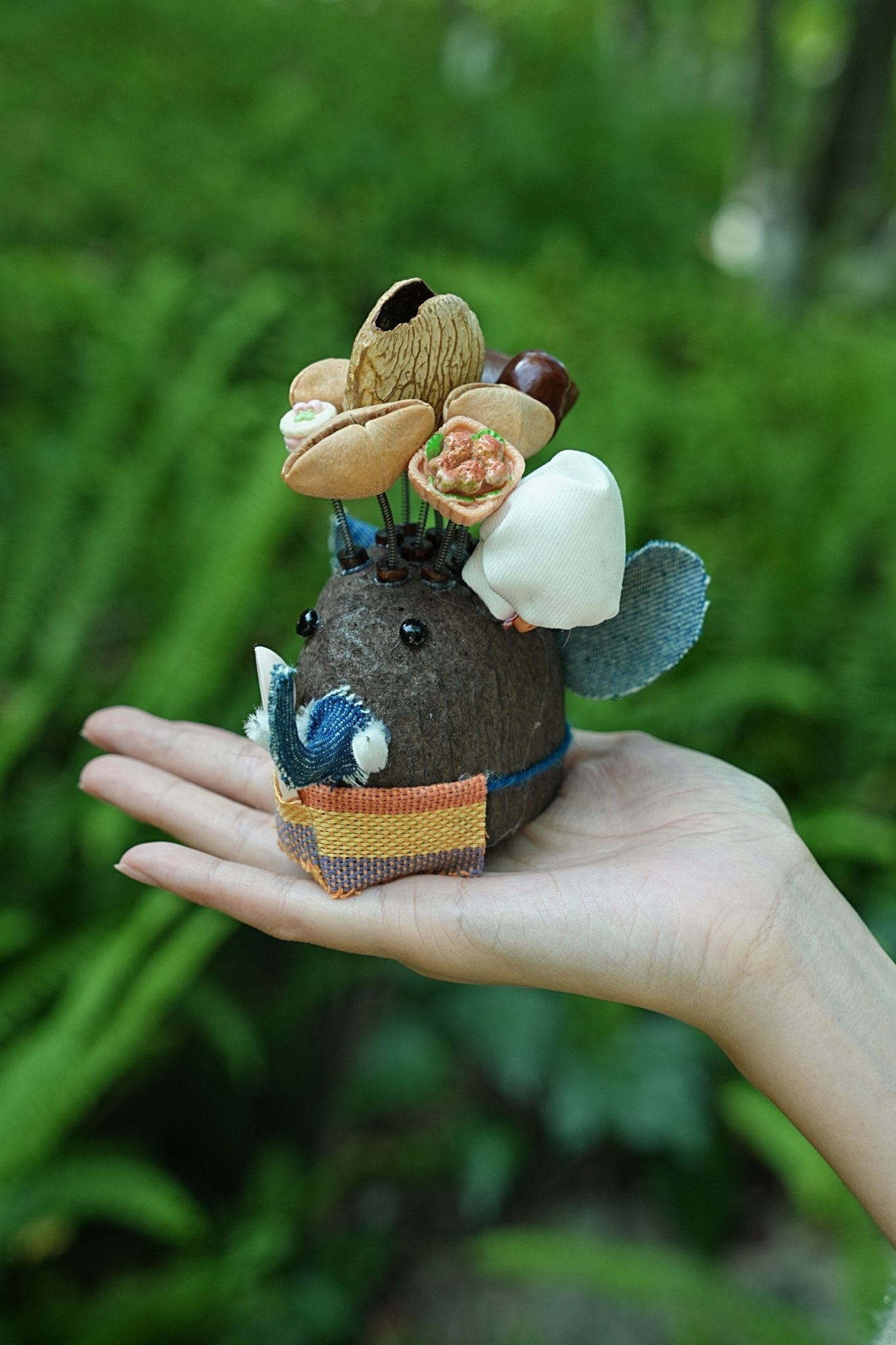 "The Feast King" - Nut Shell Elephant Doll