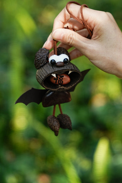 The Fortune Bat - Handcrafted Nut Shell Car Charm