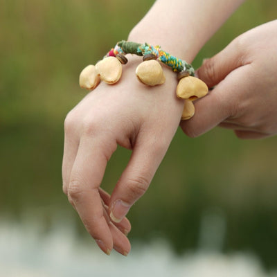 Le Pistache Heureux - Bracelet en Coquillage Naturel Tressé à la Main