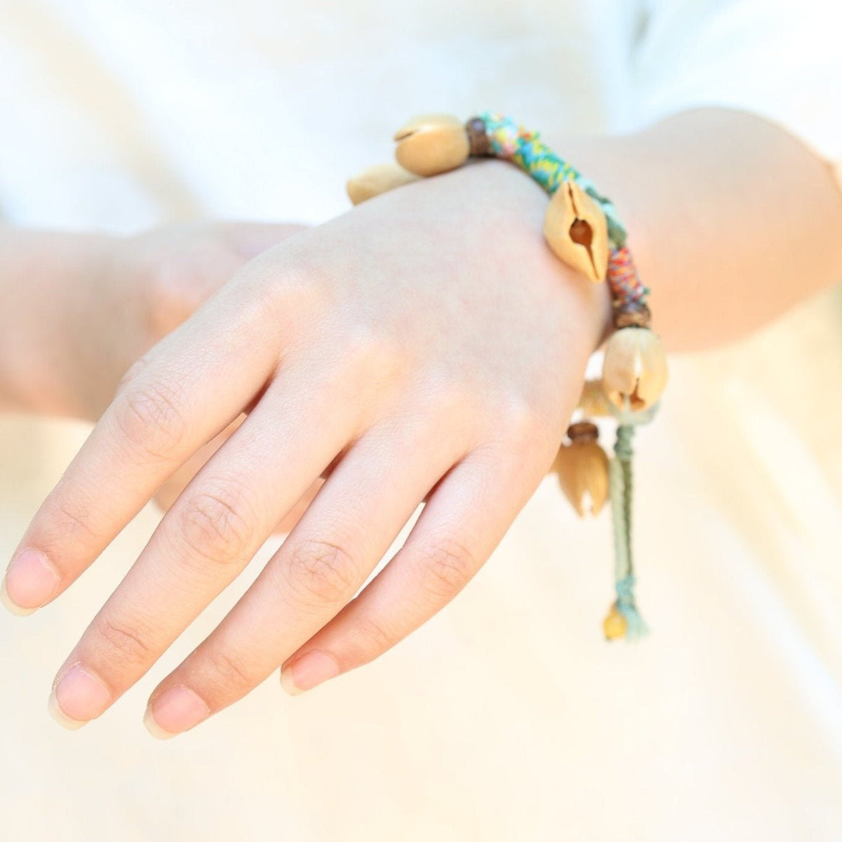 The Happy Pistachio - Hand-Braided Natural Shell Bracelet