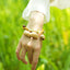 The Meadow Dancer - Yellow & Green Braided Bracelet with Natural Seed Bells