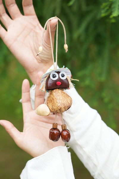 The Seed Sprite - Handcrafted Nut Shell Doll Charm