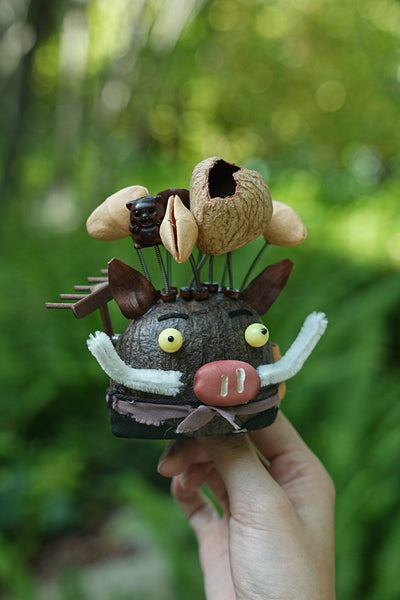 The Wild Guardian - Nut Shell Boar Doll with Rake & White Tusks