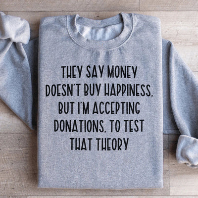 Sudadera "Dicen que el dinero no compra la felicidad"