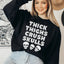 Sudadera con muslos gruesos y calaveras aplastadas