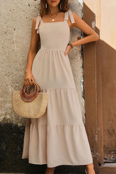 Robe à bretelles nouées avec smocks et volants