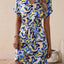 Robe courte à manches courtes et décolleté en V imprimée avec lien