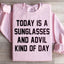 Aujourd'hui est un jour de sweat-shirt avec lunettes de soleil et Advil