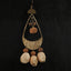 L'Écho Tribal - Boucles d'oreilles en bronze martelé asymétriques et graines naturelles