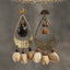 L'Écho Tribal - Boucles d'oreilles en bronze martelé asymétriques et graines naturelles
