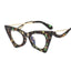 Elegantes montura de gafas de ojo de gato para mujeres con lentes transparentes