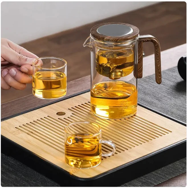 Elegante tetera de vidrio y juego de té con separación de agua