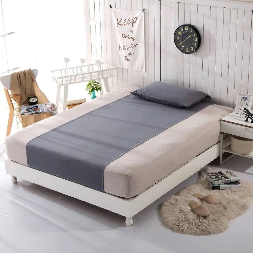 Drap housse de mise à la terre