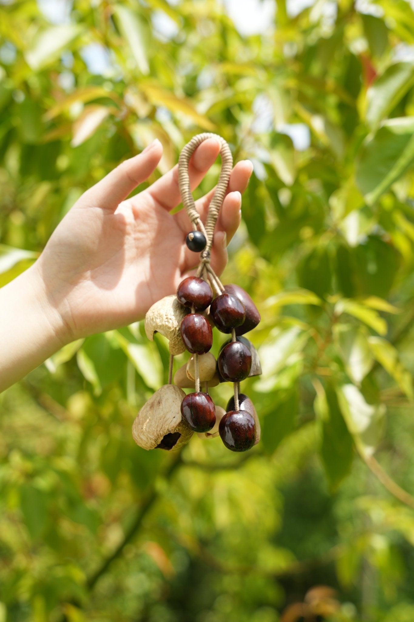 The Deep Woods Rattle - Dark Nut & Hollow Pod Cluster Charm