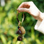 The Forest Bell - Handcrafted Nut Shell & Tassel Bag Charm