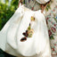 The Forest Bell - Handcrafted Nut Shell & Tassel Bag Charm