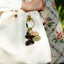 The Forest Bell - Handcrafted Nut Shell & Tassel Bag Charm