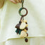 The Forest Harvest - Cascading Nut Shell & Green Tassel Bag Charm