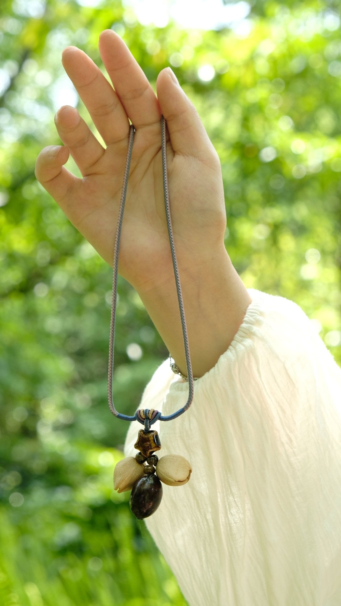 The Guiding Star - Natural Seed Pendant Necklace