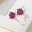 Boucles d'oreilles en rose réelle avec chaîne de perles - Bourgeon rouge et fleur violette