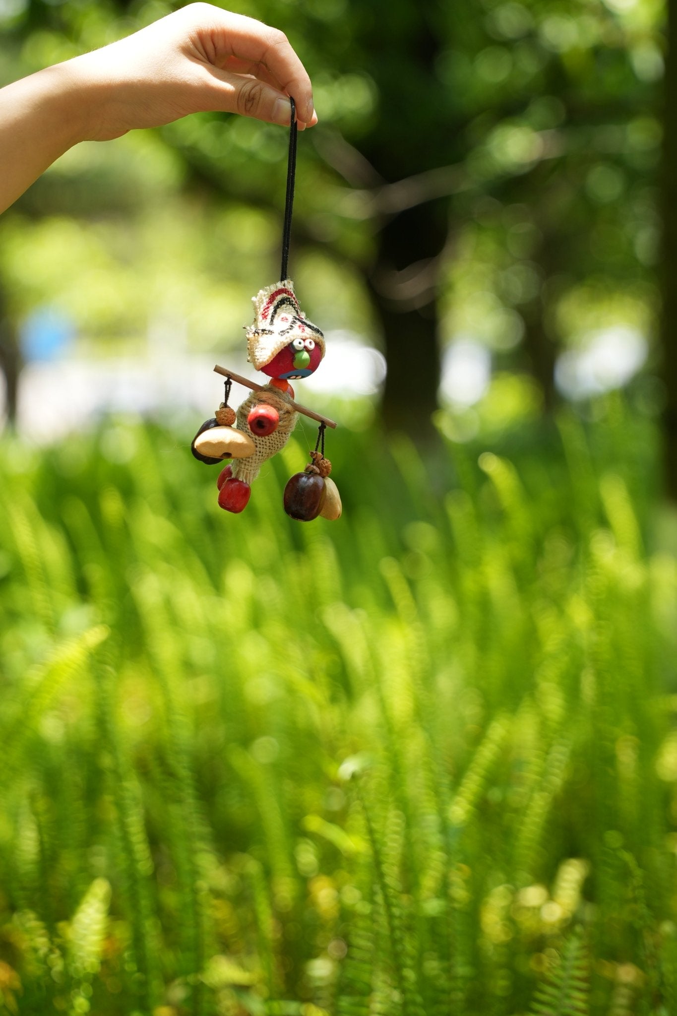 The Tribal Nomad - Handcrafted Burlap & Red Wood Doll Charm