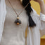 La Cloche Zen - Collier Pendentif Minimaliste en Graine et Rudraksha
