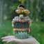 The Zen Master - Nut Shell Buddha Doll on Magnetic Lotus Base