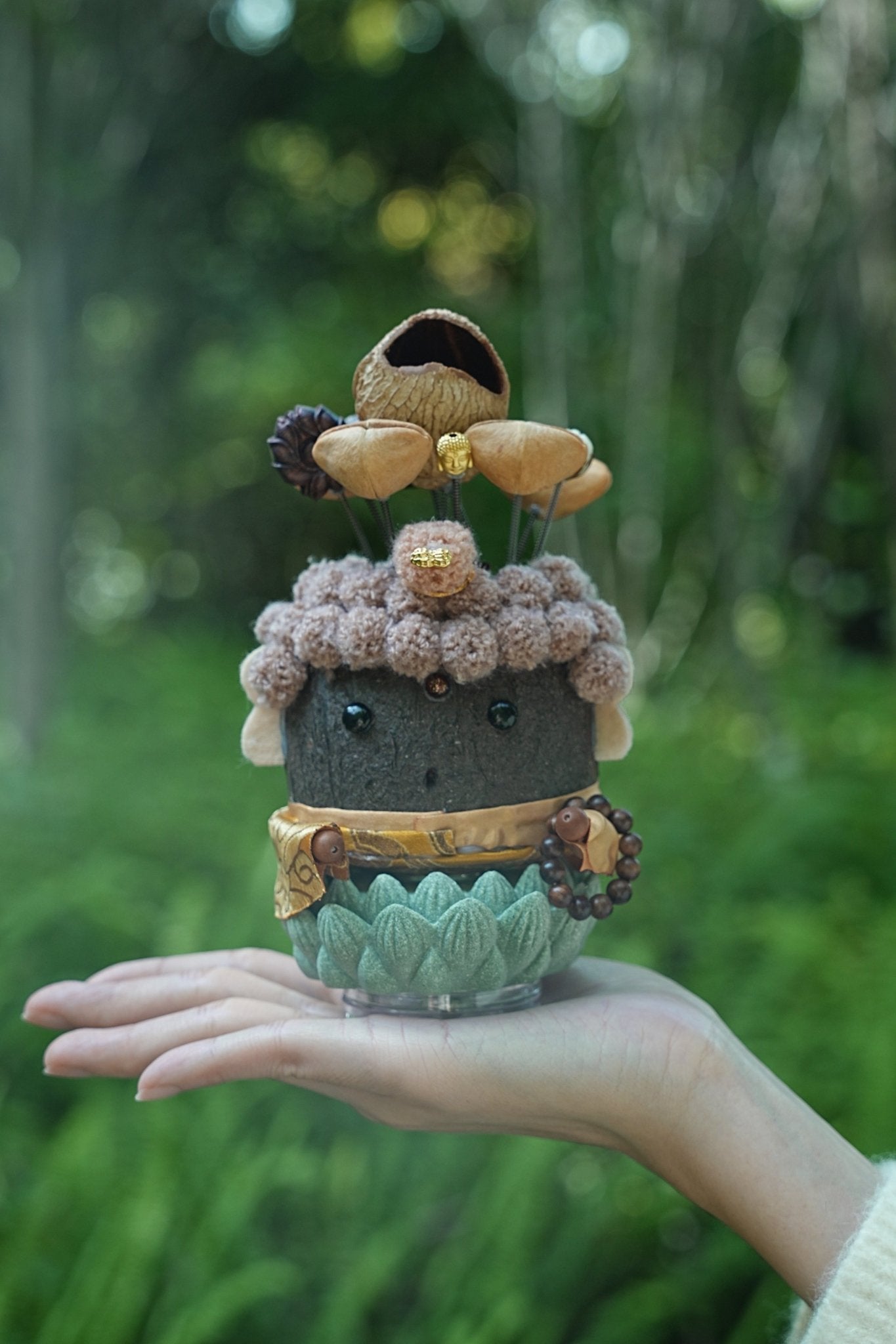 The Zen Master - Nut Shell Buddha Doll on Magnetic Lotus Base